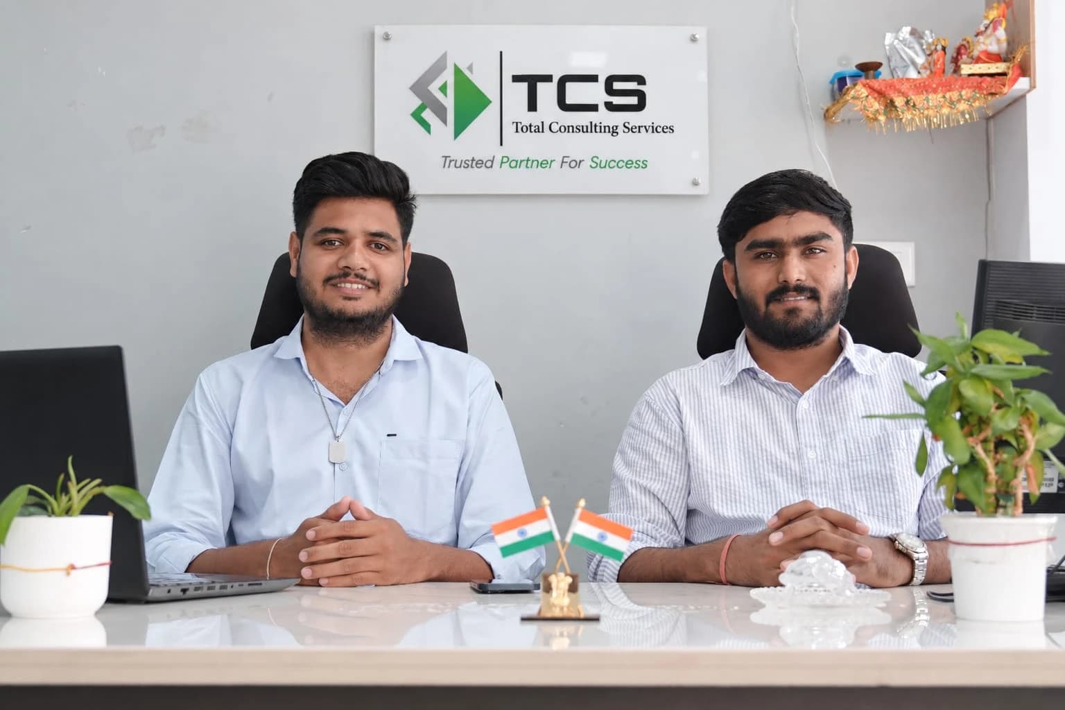 Aniket Mishra and Manish Rabari, Directors of Total Consulting Services, at the Ahmedabad office